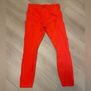 Athleta leggings, size small, EUC, reddish/orange color